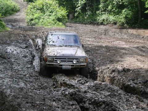 1979 Ford Bronco - This 4Runner is really stuck in the mud, with the front tires deep in a rut.