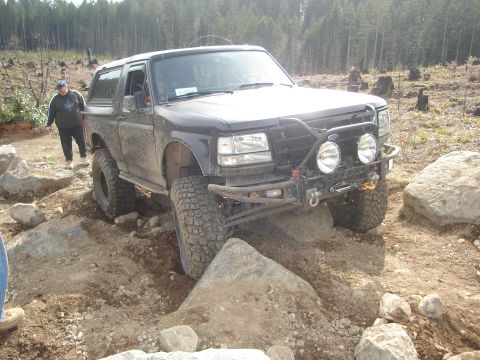 1989 Ford Bronco - A modified 1989 Ford Bronco tackles a challenging off-road course.