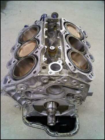 1994 Ford Probe - Engine block with cylinders and crankshaft. Text "SUPER MOTORS" is visible at the bottom.
