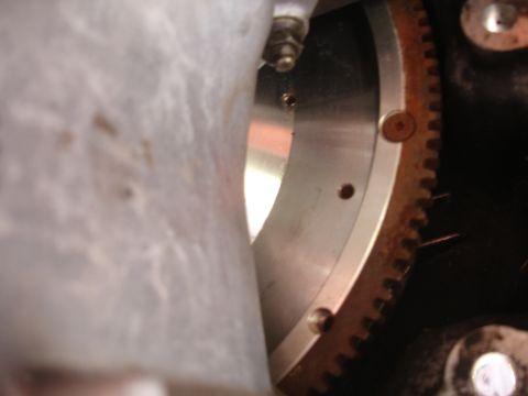1995 Ford Taurus - This image shows a close-up view of a vehicle's flywheel and its associated starter ring gear.