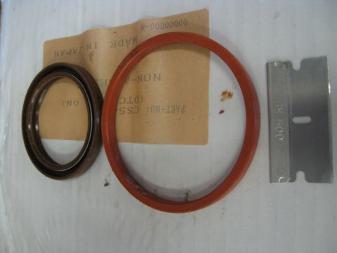 1994 Ford Probe - Two seals and a razor blade are shown with packaging that includes Japanese text and part numbers.