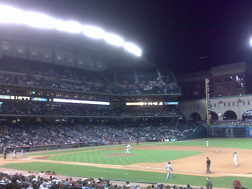 Baseball stadium with crowd and field during a game