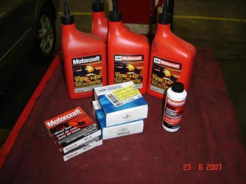 2007 Ford Mustang - Collection of Motorcraft automotive fluids and parts, including rear axle lubricant and wheel seals.