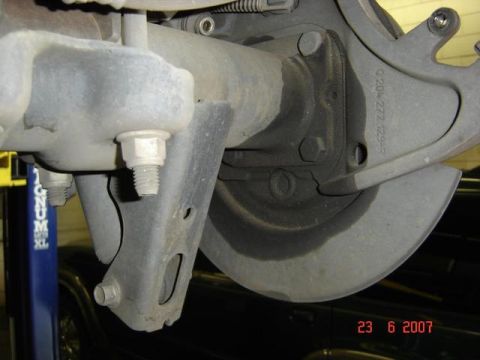 2007 Ford Mustang - Close-up view of rear axle and suspension components, with a date stamp of June 23, 2007 visible.
