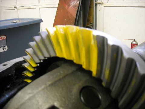 1979 Ford F-150 - Close-up of a differential gear with yellow paint applied to its teeth.