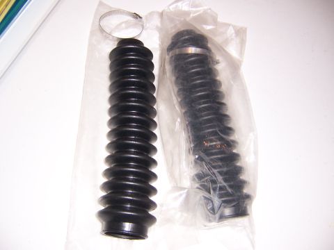 1987 Ford Bronco - Pair of rubber bellows, likely for suspension or steering components, with hose clamps.