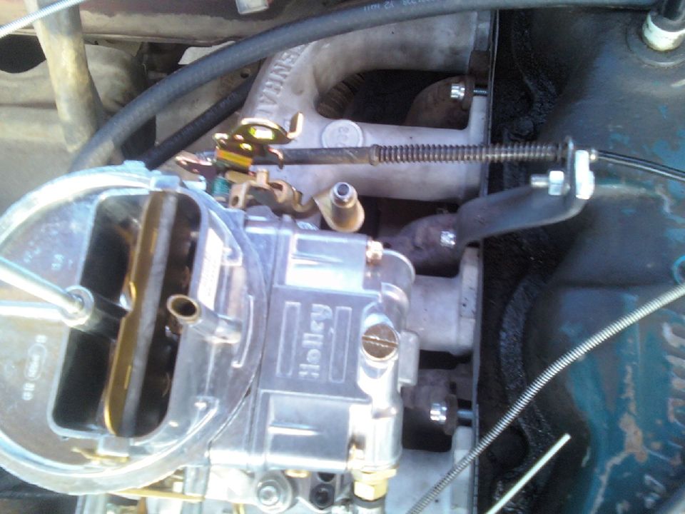 Holley carburetor with engine manifold and cables