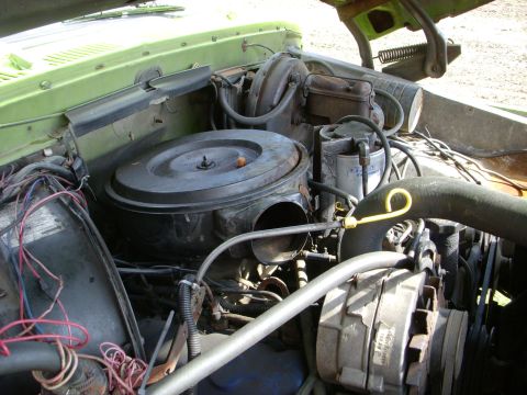 1974 Ford F-350 - Close-up view of the engine compartment, showing various mechanical components.