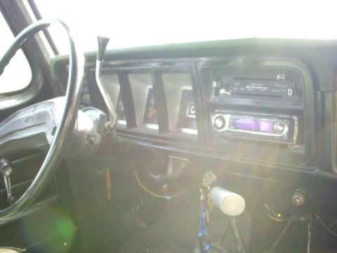 1974 Ford F-350 - Interior view of a 1974 Ford F-350, the steering wheel and dashboard.