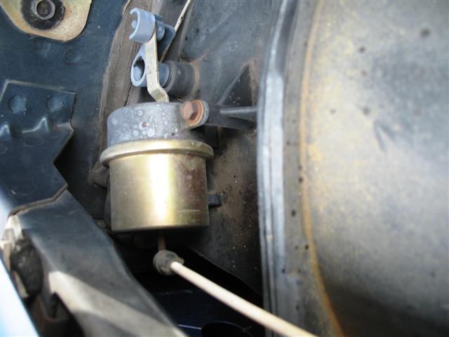 Vacuum canister and linkage