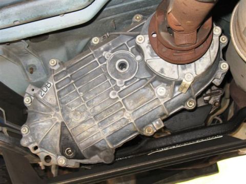 1992 Ford Bronco - Underside view of a vehicle's transfer case, showing '2DB' and 'REAR' markings.