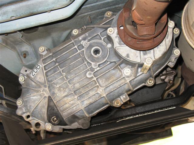 Transfer case with '2DB' and 'REAR' markings