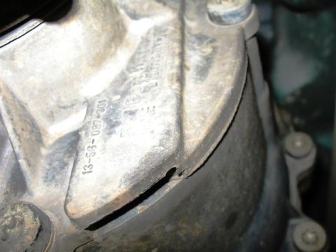 1992 Ford Bronco - A close-up view of a metal component shows stamped identification numbers.