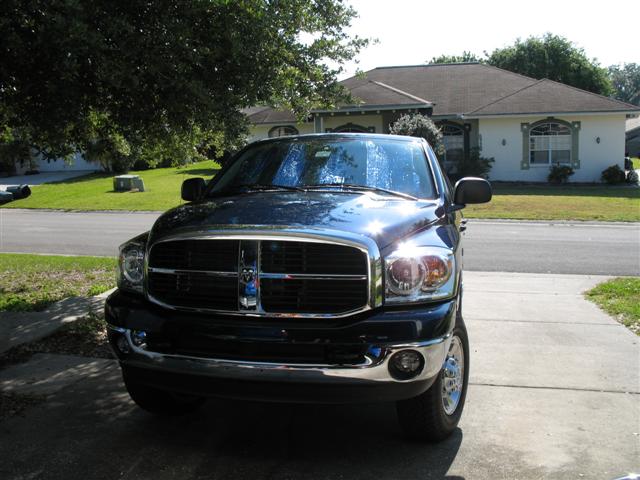 Dark blue 2008 Dodge Ram 1500 pickup truck parked in driveway.