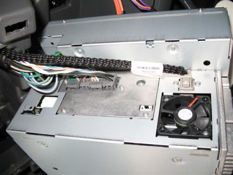 2008 Dodge 1500 - Back of the Radio. Note the white plug in the lower left hand side with the spade connector below it. You need this on the radio to be able…