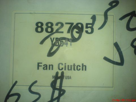 1992 Ford Crown Victoria - A close-up of a yellowed label with black text reads "882795 Fan Clutch" and "M USA". There are handwritten markings in black marker over t…