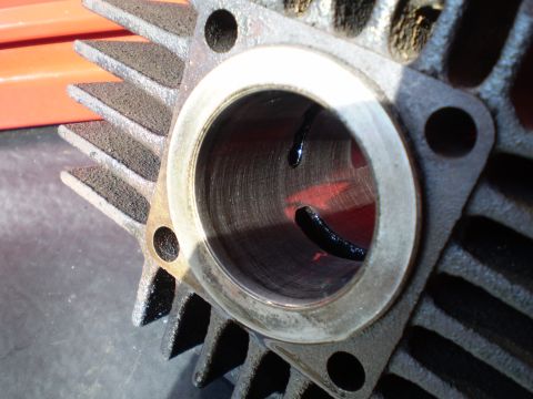 1981 Garelli Rally Sport - Motorcycle cylinder head showing internal wear and cooling fins.