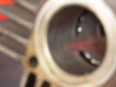 1981 Garelli Rally Sport - A blurry close-up shows the interior of an engine cylinder, possibly during a rebuild.