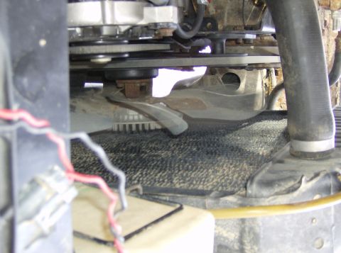 1979 Ford Bronco - Close-up view of the engine fan and belts, showing mechanical components.