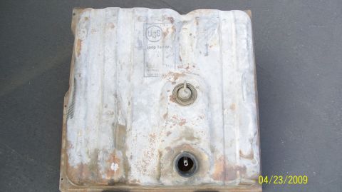1972 Ford Ranchero - A weathered metal fuel tank, possibly for a classic vehicle, is shown from above.