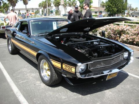 1992 Ford Crown Victoria - This black 1970 Ford Mustang Boss 302 features gold side stripes and a GT500 badge.