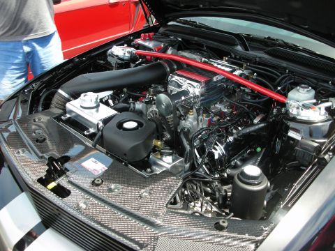 1992 Ford Crown Victoria - Modified engine bay with a prominent supercharger and custom components.