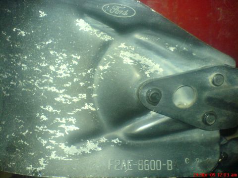 1992 Ford Crown Victoria - A Ford engine part is shown with a Ford logo and part number visible.