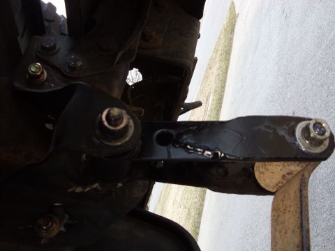1988 Ford Bronco - Close-up view of modified suspension components, showing welds and hardware.
