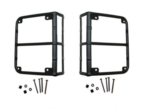 2008 Jeep Wrangler - Two black metal tail lamp guards and their associated screws and washers are displayed against a white background.