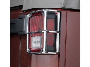 2008 Jeep Wrangler - Chrome tail light guard accessory for a Jeep Wrangler, focusing on the rear light.