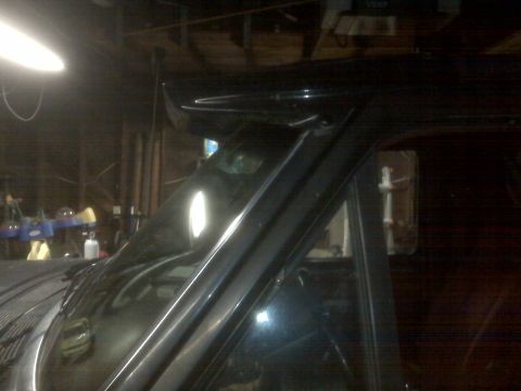 1995 Ford Bronco - The vehicle is parked indoors, with overhead lighting visible in the background.