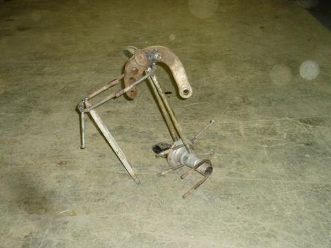 2000 Ford E350 - This metal sculpture appears to be made from old vehicle parts welded together.