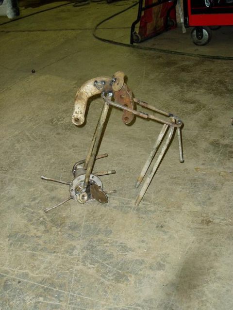 2000 Ford E350 - A welded metal sculpture resembling a horse stands on a workshop floor.