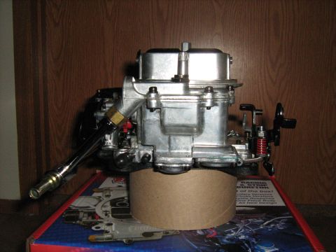 1988 Mercury Grand Marquis - A Holley carburetor is shown on a box with a SuperMotors.net logo visible.
