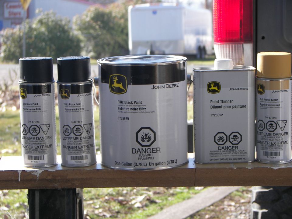 John Deere Blitz Black Paint spray cans, gallon can, and paint thinner can