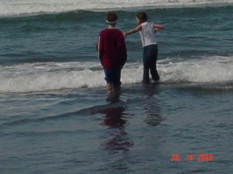 1989 Ford Bronco - My kids playing in the waves