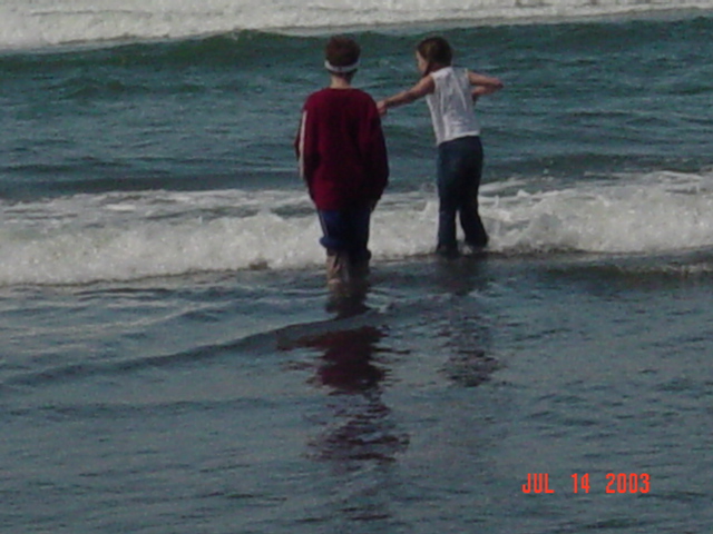 My kids playing in the waves