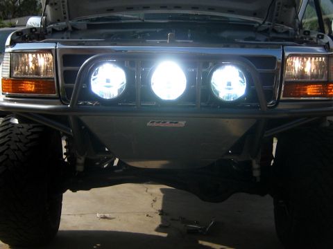 1996 Ford Bronco - This Ford truck features a custom front bumper with auxiliary lighting, suggesting off-road modifications.
