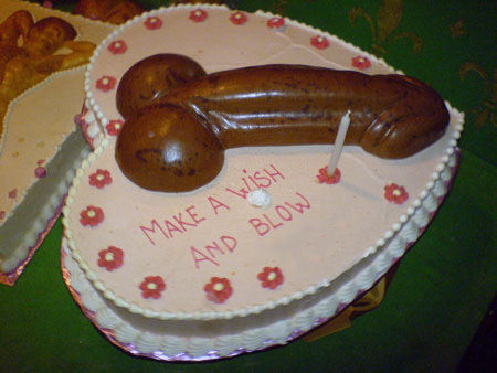 1989 Ford Bronco - A cake decorated with a phallic shape and the words 'Make a wish and blow'.