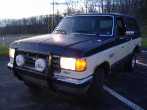 1988 Ford Bronco - This 1988 Ford Bronco features a two-tone paint scheme and auxiliary lights on the front bumper.