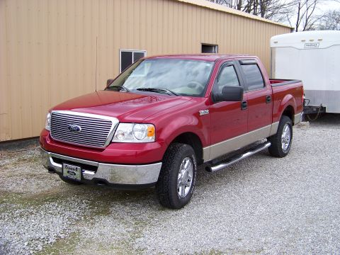 2008 Ford F-150 - This red pickup truck, likely from the mid-2000s, is shown from a three-quarter front angle.
