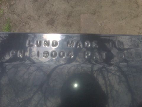 1995 Ford Bronco - Metal part shows "LUND MADE IN PN 19004 PAT D28" text.