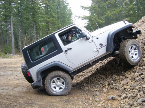 2005 Jeep Wrangler - My youngest daughter and our dog buddy on the rock pit..