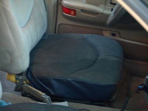 1999 Ford Crown Victoria - Interior view of car seats and dashboard, showing the cabin details.