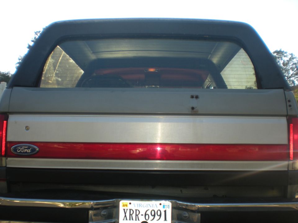 Rear view of a Ford Bronco with a Virginia license plate