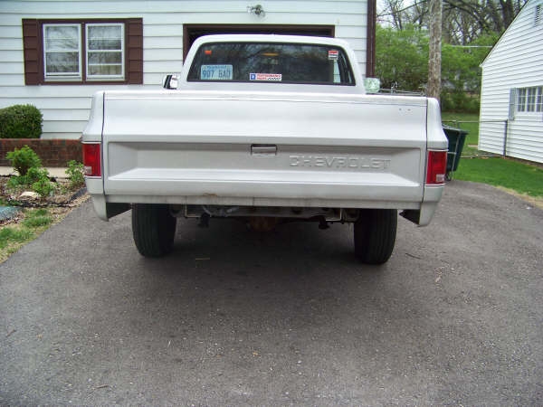 1986 Chevrolet C/K Pickup truck, rear view, silver