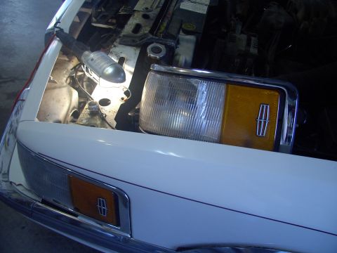 1990 Lincoln Town Car - Time to change the parts. The used replacement sits under the hood.
