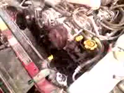 1998 Subaru Legacy - FIRST time starting the L. Cannabalized a timing belt tensioner and mounting bracket from a EJ25 with 100k on it, used the original timing…