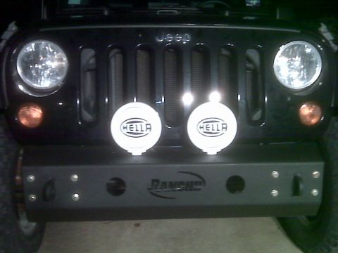 2008 Jeep Wrangler - Front view of a black Jeep Wrangler with a Rancho bumper and Hella lights installed.