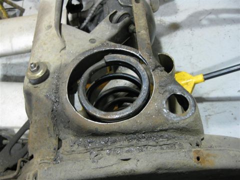 1984 Ford LTD Crown Victoria - Enlarging the holes to 6-1/4" with one of their cordless grinders and a plug stone.